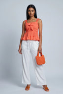 Smocked Bow Peplum Top