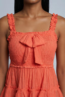 Smocked Bow Peplum Top