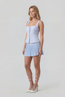 Metallic Button Sleeveless Peplum Blouse