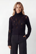 Distressed Rib Knit Turtleneck Sweater