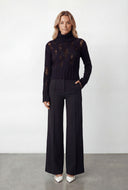 Distressed Rib Knit Turtleneck Sweater